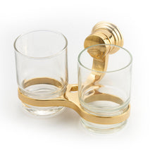 Load image into Gallery viewer, A gold-colored double cup holder made of zinc alloy, designed to hold two glasses, with a single handy lever for adjusting the spacing.