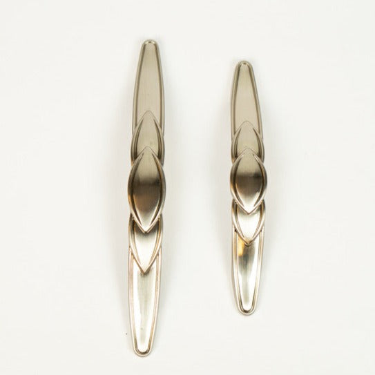 Two silver matte cabinet pulls against a white background