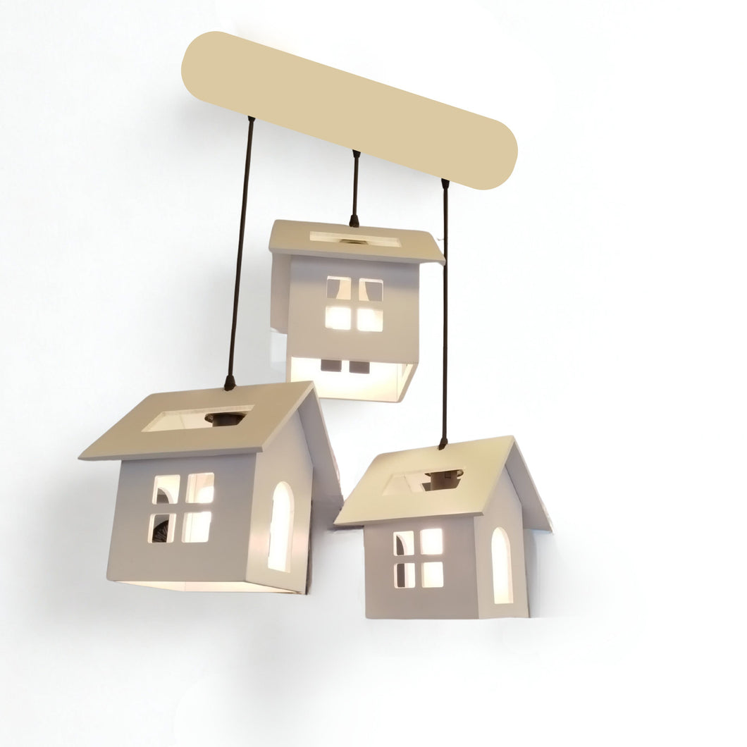 Set of four house-shaped pendant lights on a white background