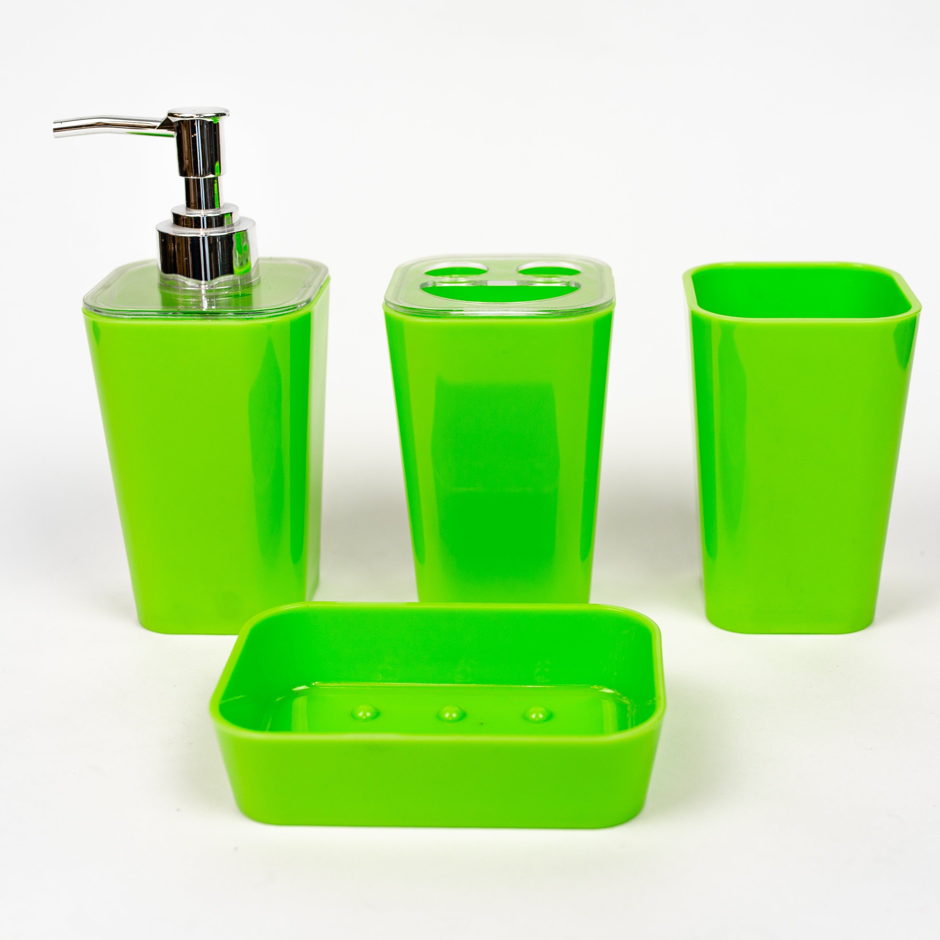 A set of green acrylic bathroom accessories, including a soap dispenser, toothbrush holder, tumbler, and soap dish.