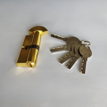 Load image into Gallery viewer, Gold cylindrical lock with keys on a white background

