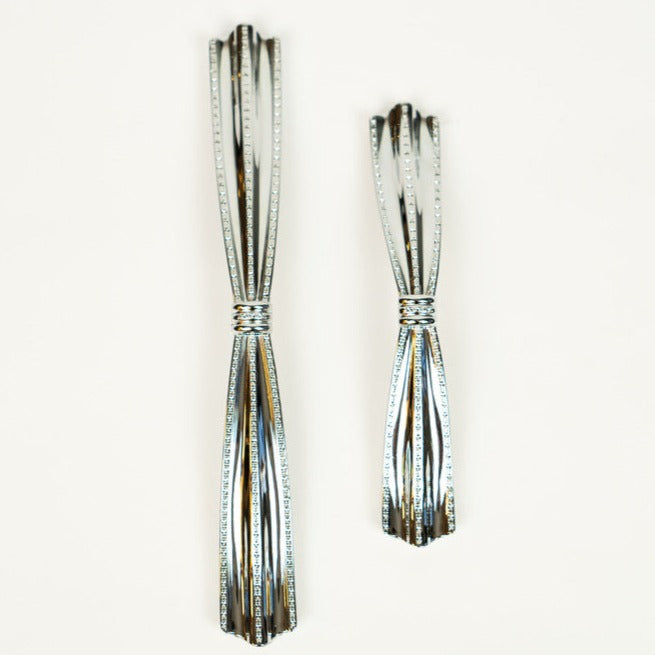 Two silver zinc alloy cabinet pulls with a twisted rope design, displayed against a white background.