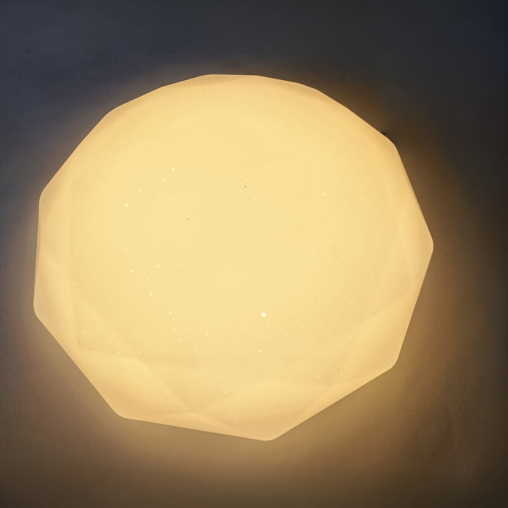 Octagonal ceiling light fixture on a dark background
