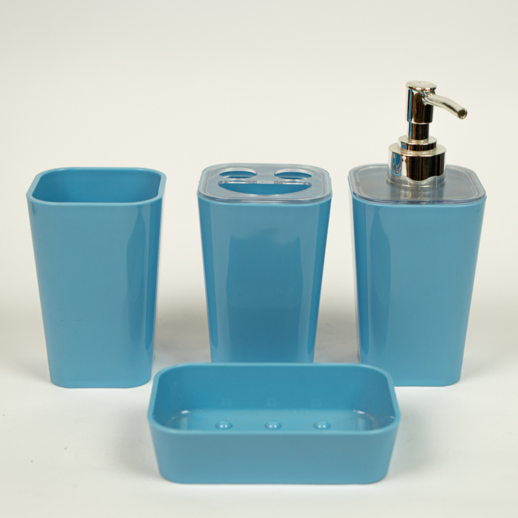 A set of Blue acrylic bathroom accessories, including a soap dispenser, toothbrush holder, tumbler, and soap dish.
