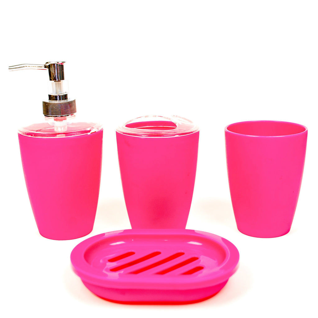 A set of pink acrylic bathroom accessories including a soap dispenser, two cups, and a soap dish.