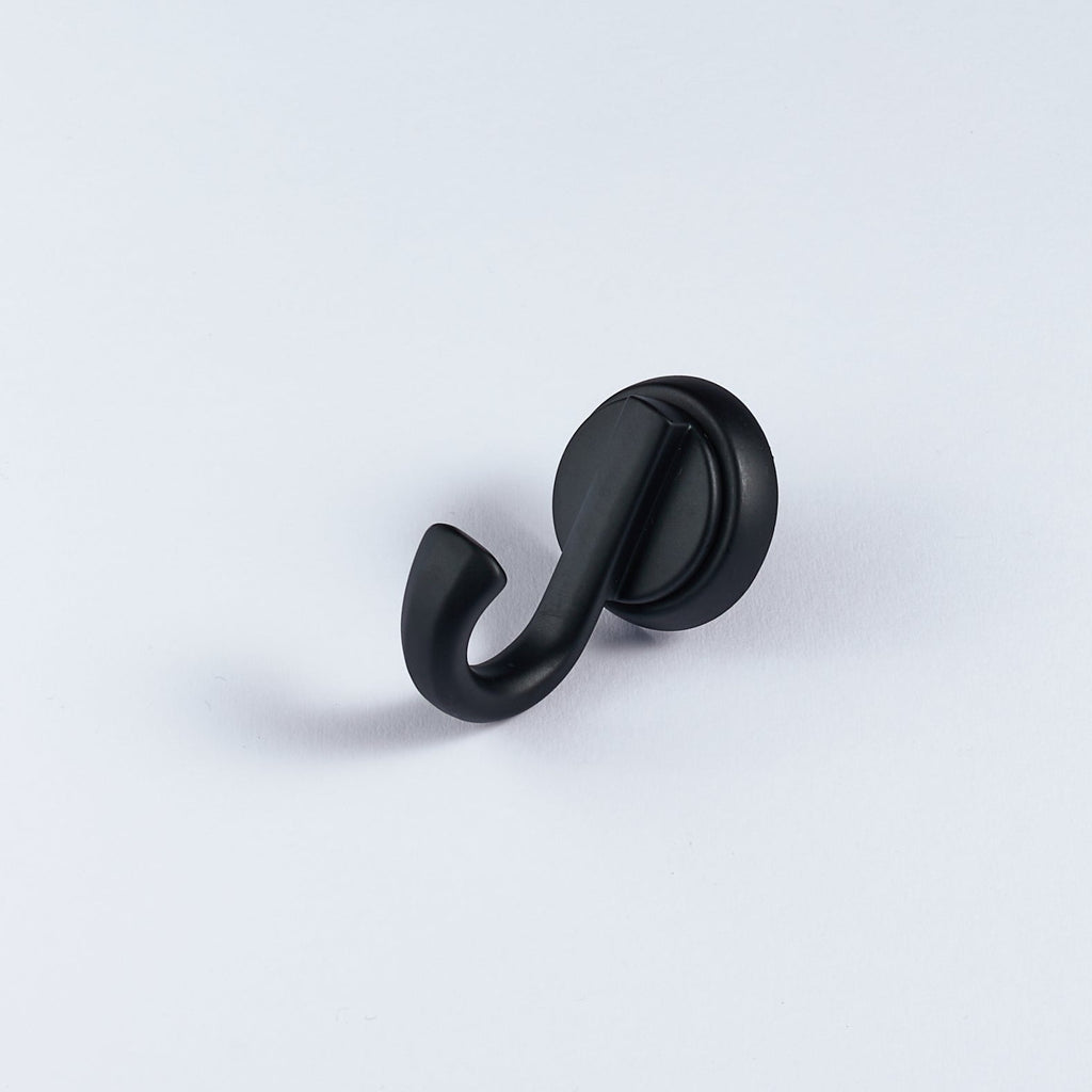 A single black metal hook with a curved shape on a white background.